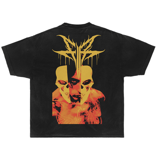 A black short-sleeve t-shirt featuring a large graphic print on the back with two yellow skulls, a split face, and a yellow thorn-like crown above.